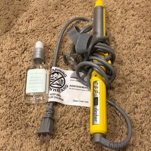 Dry bar curling iron and treatment oil.